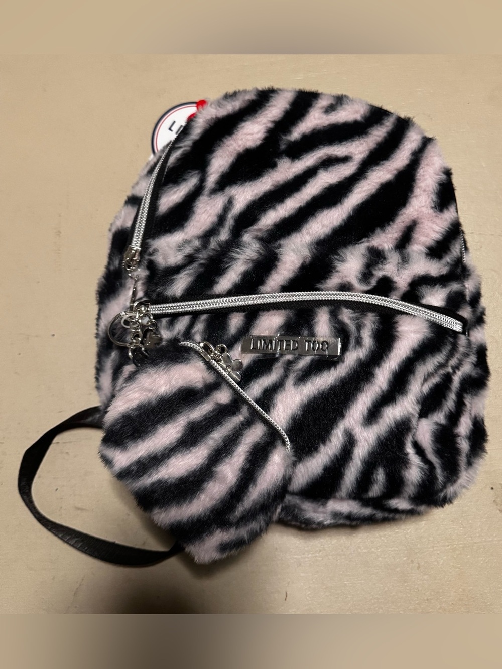 Limited Too very light Pink and Black Zebra Faux Fur Mini Backpack